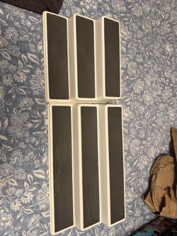 Risers for cabinets