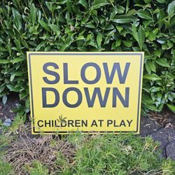 24x18 SLOW DOWN safety sign