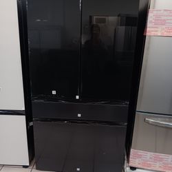 New 4-door display refrigerator 36 wide by 70 high 29 deep