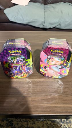 The Pokémon TCG: Mega Moonlit Tins