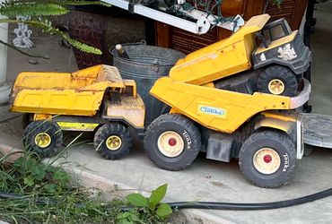 Three Tonka Trucks