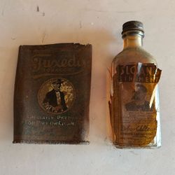 Antique Tin And Bottle