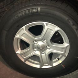 Five brand new jeep wrangler, tires with wheels 