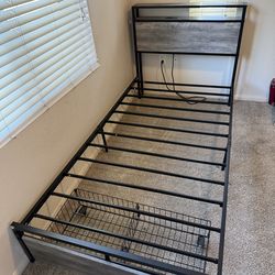 Twin XL bed frame w/ charging station and roll out drawers