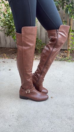 Knee high brown leather boots