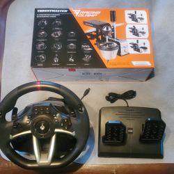 Xbox One Pro Gamer Steering Wheel + ThrustMaster Racing Clamp.