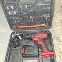 DRILL WITH CHARGER AN BATTERIES 