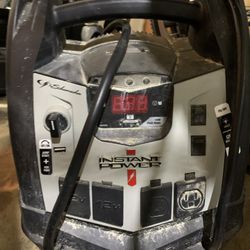 Schumacher Instant Power Portable Jump Starter with Air Compressor and Light