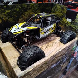 1/18 scale Losi Capra RC Rock Crawler Mickey Thompson Edition. With front and rear steering