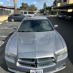 Vendo dodge charger 2014 3.6  150 k millas