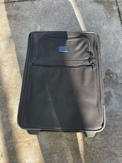 TUMI carry on suitcase