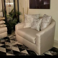 Cream color oversize swivel chair 