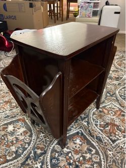 Side table with side magazine holder on each side