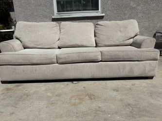 Delivery Available/ Living Spaces Sand Colored Couch sofa