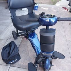 V8 FOLDING ELECTRIC SCOOTER NEW HAVE NOT USED ONLY ABOUT 40LB WEIGHT  