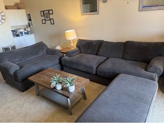 Coffee table, 2 end tables, large couch with ottoman, and love seat