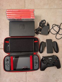 Nintendo Switch + 5 Games + Pro Controller + Case