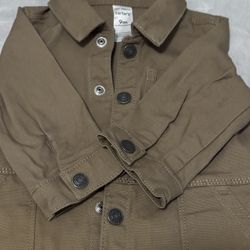 6-9 months. Worn once / Like new