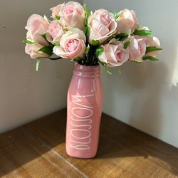 Pretty ceramic Rae Dunn “BLOSSOM” milk bottle vase with fake roses.