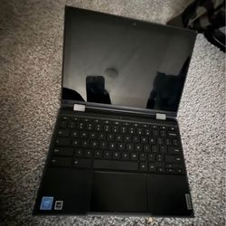 Two laptops one Red HP and one Chromebook