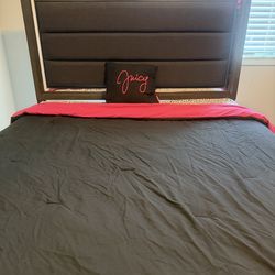 Queen size bed with mattress and dresser