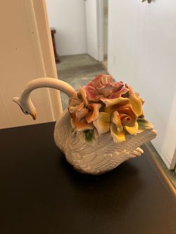 Porcelain Swan Figurine with Floral Arrangement