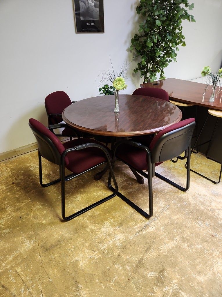 Table and 4 chairs.