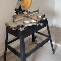 Mitre saw with base