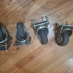 Pack of 4 Swivel 4 inch d x 2 in w Polymer Caster Wheels with nuts 