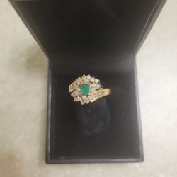 14 K Gold Emerald And Diamonds Ring.  Weight Is 4.8 Grams 
