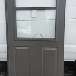 New Anderson 36 inch storm door Brown.