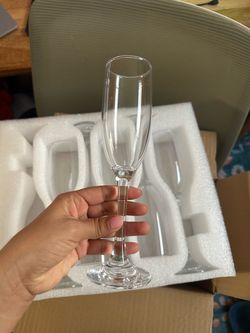 12 brand new champagne glasses