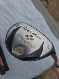 Taylor made rescue number three nineteen degrees.Well used golf club driver