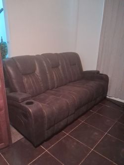 Dark brown faux leather couch