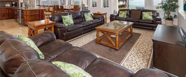 3 brown leather sofas