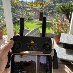 DJI Mavic Mini Drone, comes with battery, controller, controller to usb C and lightning cable, spare propeller