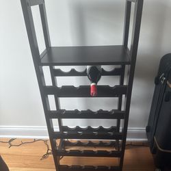Dark brown/chocolate colored wine rack with two shelves, holds 20 bottles