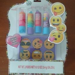 BRAND NEW IN PACKAGE EMOJI ICONIC FLAVORED LIP BALM WITH PURPLE EMOJI ICONIC BLINGED OUT MAKE-UP CASE - AGES 8+