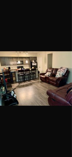 Leather reclining sofas the set for $450 good conditions no tears.