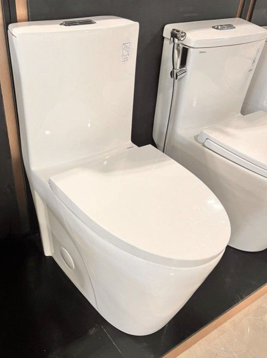 Toilet New.    Bathroom Vanity 