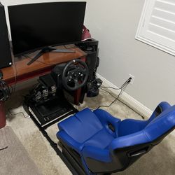 Full Logitech racing sim and 32in curved monitor
