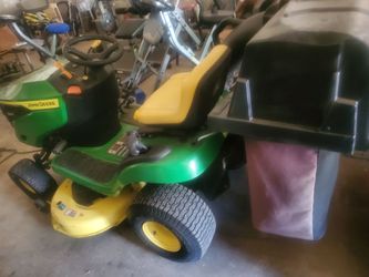 John deere s100,with bagger,and only 64hrs