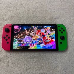 SWITCH OLED with 125 SWITCH GAMES and 512GB