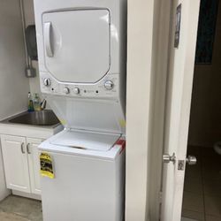 Brand new stackable washer and dryer