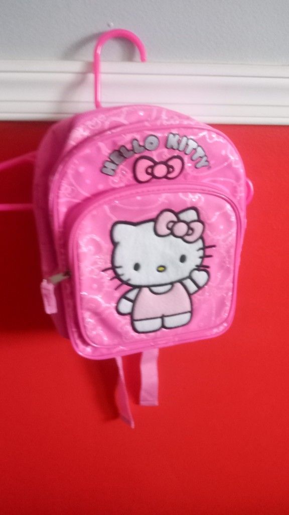 HELLO KITTY SMALL BACKPACK..... CHECK OUT MY PAGE FOR MORE ITEMS