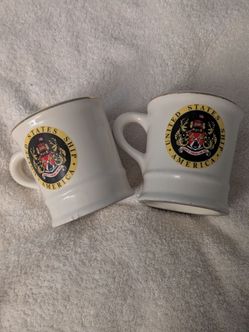 USS America coffee cups.