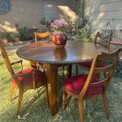 Teak Dining Table and the Heywood Wakefield Chairs
