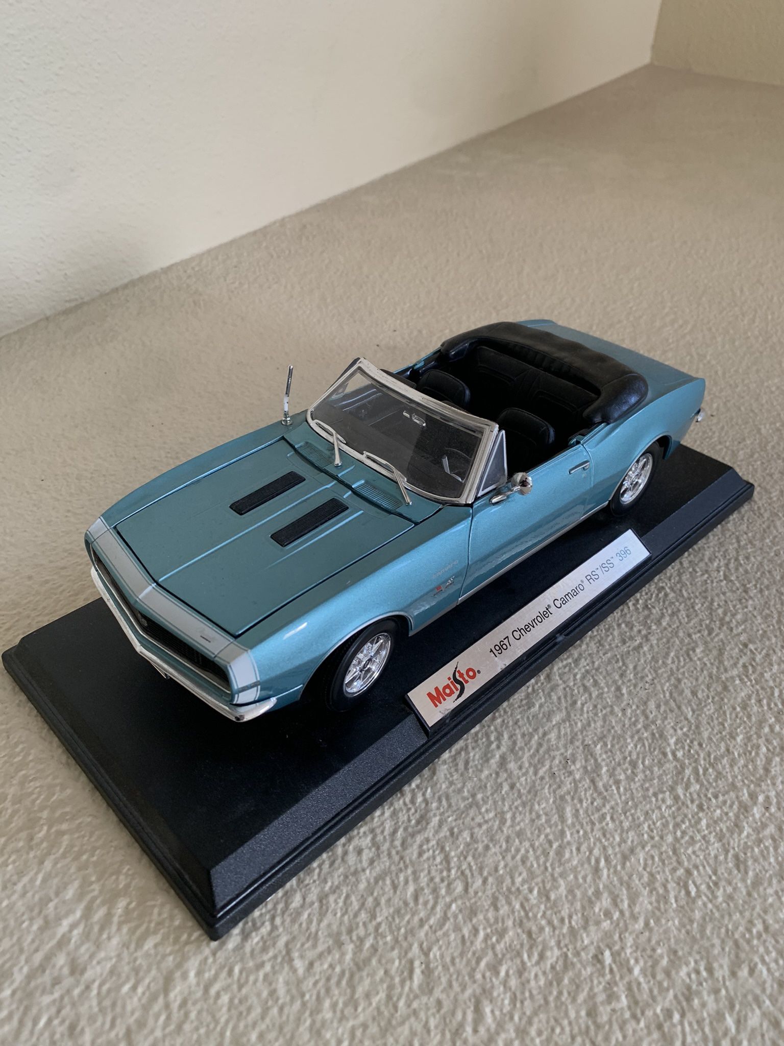 Blue Chevy Camero mini car model.
