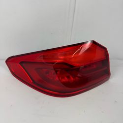 BMW 5 series quarter panel mounted tail light driver side left