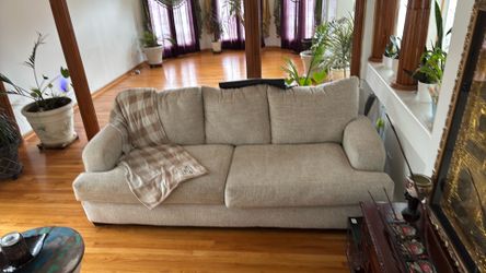 Beige Colored Sofa. Three Seater.
